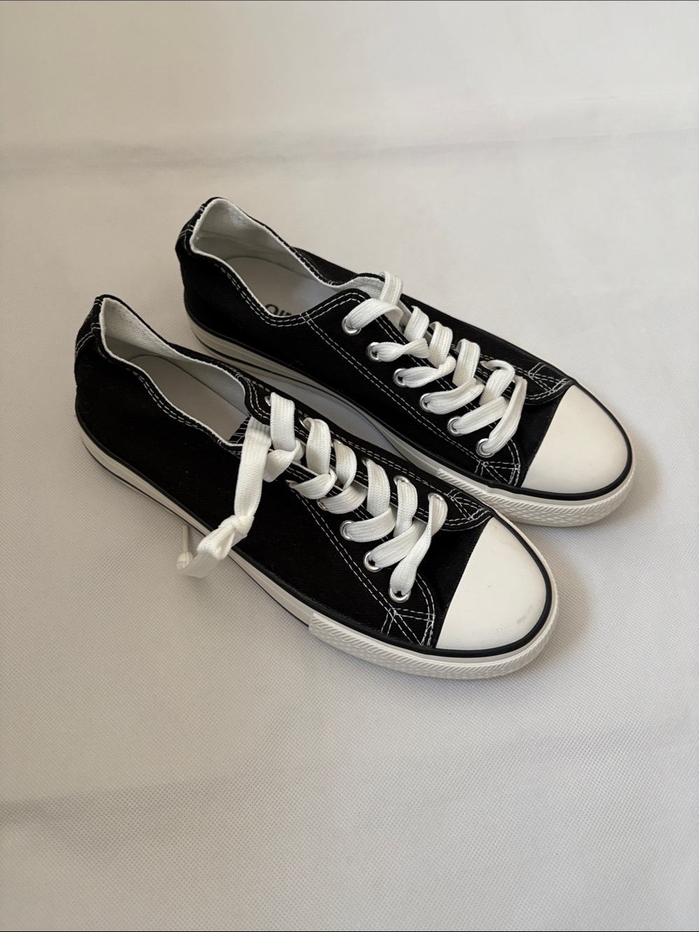 Women’s Low-Top Black Canvas Sneakers with White Trim